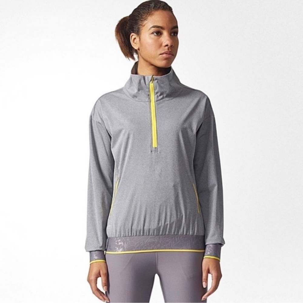 NWT Adidas Golf ClimaStorm 1/2 Zip
Windbreaker Jacket